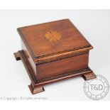 A Victorian mahogany jewellery box, of square form, the cover inlaid with scalloped shell detailing,