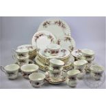 A Royal Albert Lavender Rose pattern tea and dinner service comprising; six dinner plates,