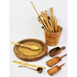 A selection of treen, to include a carved circular stand, 30cm diam, a selection of sewing needles,