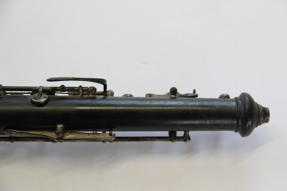 A 19th century rosewood flute by J Wallis, 135 Euston Road, with plated fittings, - Image 28 of 31