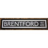 Two vintage London Bus Route Master spool signs, 'Brentford Half Acre' and 'Isleworth',