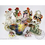A selection of 19th century Staffordshire figures including a milk maid and cow, 21cm high,