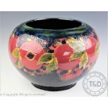 A large Moorcroft pomegranate pattern jardiniere,