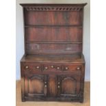 A George III and later oak high back dresser, of small proportions,