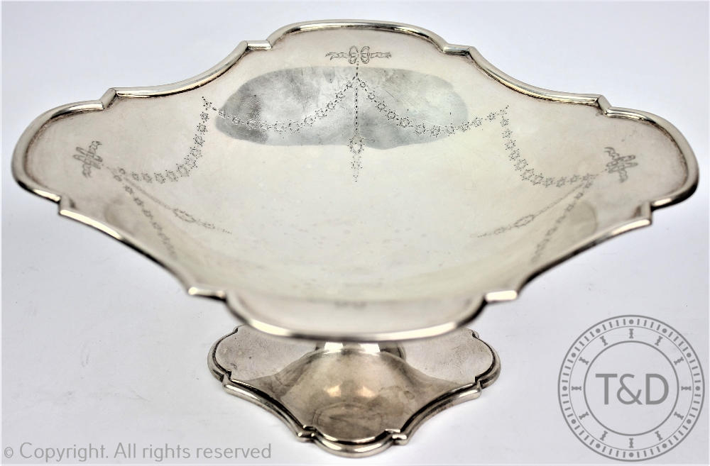 An Edwardian silver pedestal comport, John Round & Sons Ltd Sheffield 1910, of cusped cushion shape,