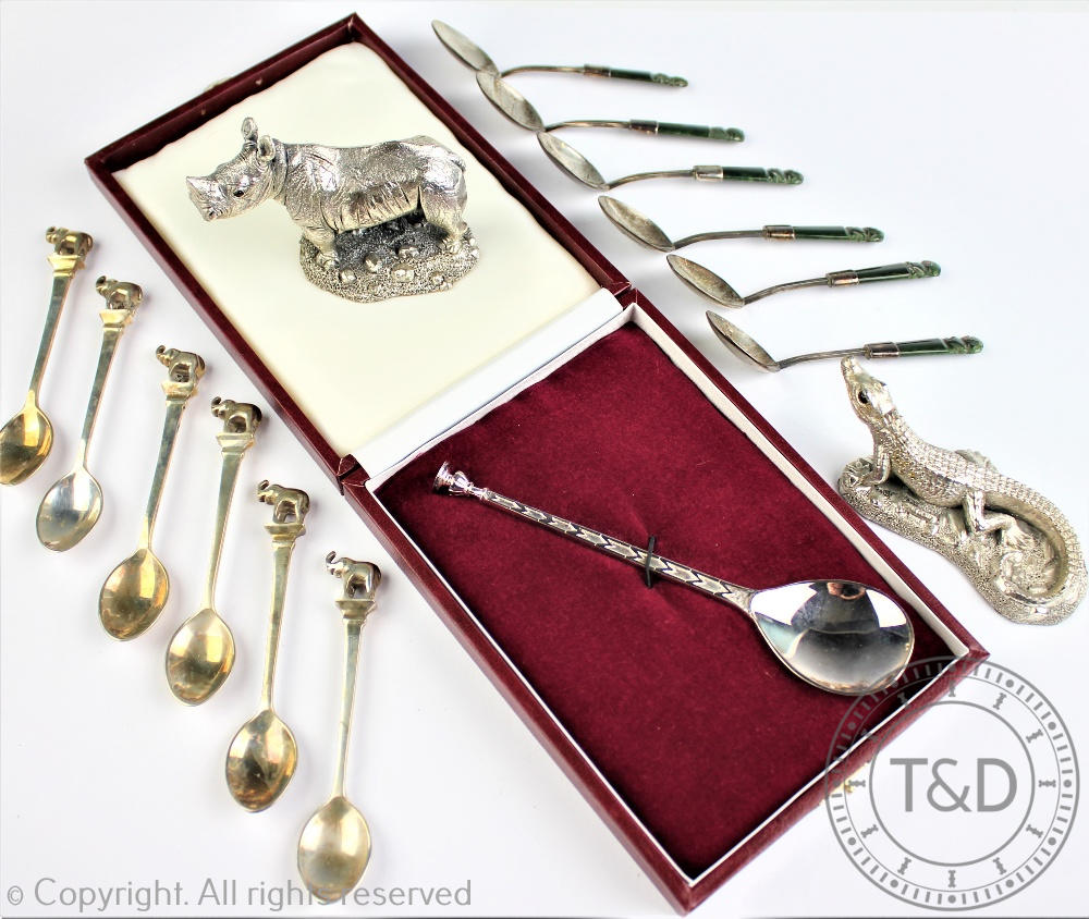 A selection of silver to include a Country Artists model of a Rhinoceros and a Alligator,