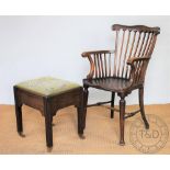 An Edwardian stained breech desk chair, with saddle seat, on turned and tapered legs, 95cm H,