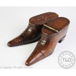 Two 19th century treen shoe form snuff boxes, one with hinged cover, the other with sliding cover,