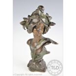 After Julien Causse - a patinated bronze bust of Flora