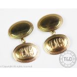 A pair of 9ct gold cufflinks 'PP Ld', designed as two oval discs joined by a chain link,