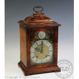 A 20th century walnut bracket clock,