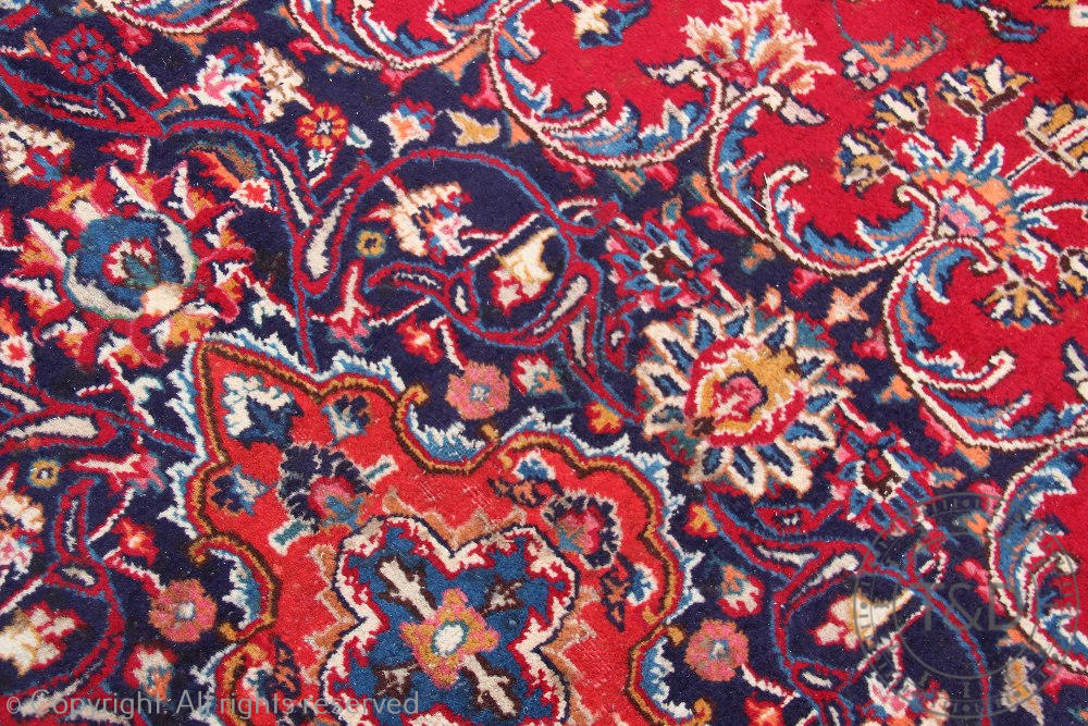 A Persian hand woven wool carpet, - Image 4 of 4