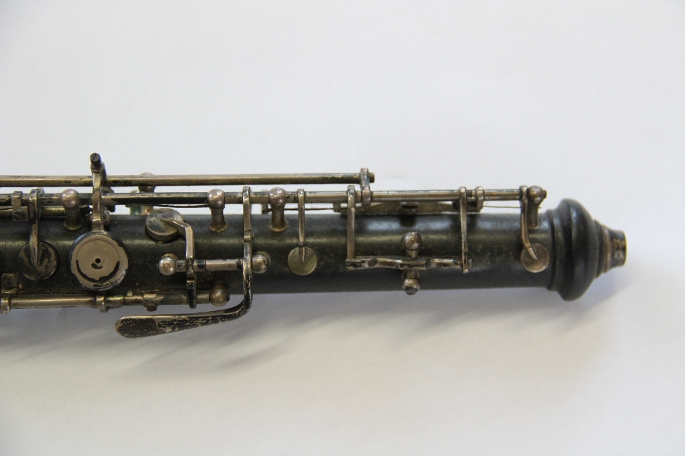 A 19th century rosewood flute by J Wallis, 135 Euston Road, with plated fittings, - Image 27 of 31