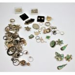 A large quantity of silver and silver coloured jewellery mounts, rings, earrings, chains,