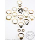 Eight vacant ring mounts, in yellow and white metal,