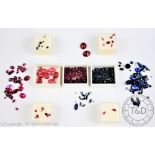 A collection of un-mounted corundum gemstones, to include; rubies and sapphires,