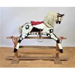 A rocking or glider horse in the manner of Collinson, circa 1950,