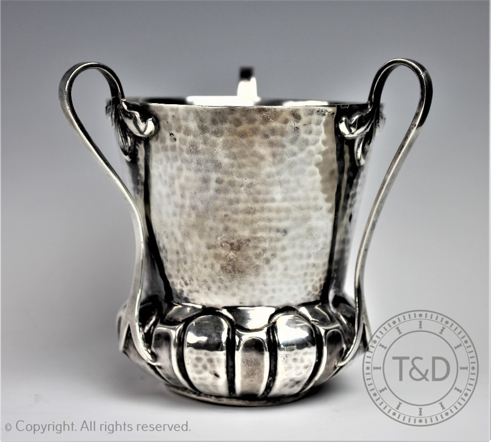 An Arts & Crafts silver tyg, Moss Morris, London 1902,