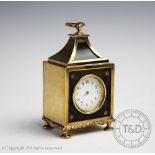 A George V silver gilt and tortoiseshell boudoir timepiece, Charles & Richard Comyns, London 1916,