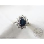 A sapphire and diamond cluster ring,