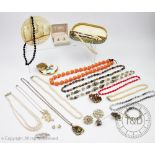 A collection of jewellery, to include; brooches, simulated pearls, a Burnham pen and pencil in box,