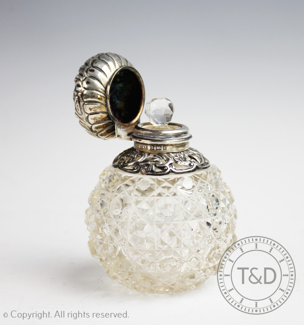 An Edwardian silver mounted cut glass scent bottle, Arthur Willmore Pennington, Birmingham 1902,