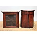 A mahogany bow front hanging corner cabinet of small proportions, 48cm H x 41cm W,