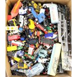 A miscellaneous collection of loose die cast toys and vehicles,