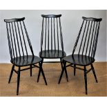 A set of six Ercol Goldsmith pattern dining chairs, including one with arms,