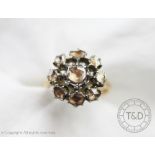A rose cut diamond set cluster ring,