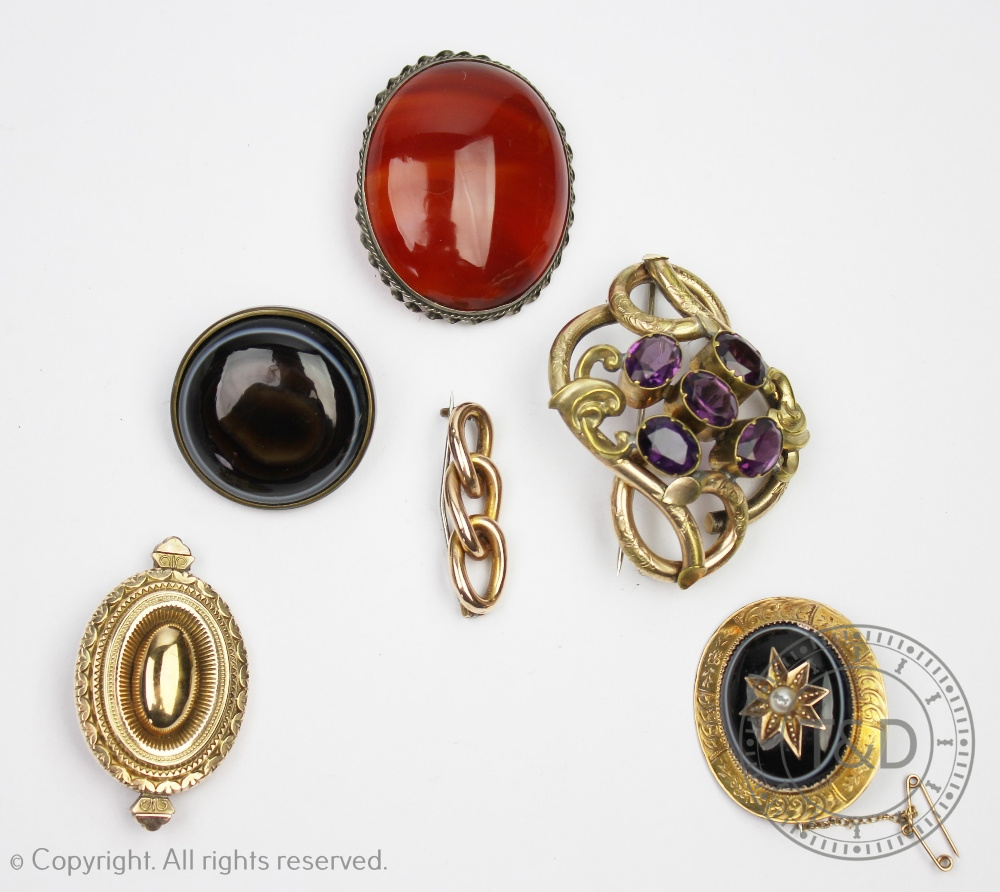 Six assorted brooches, to include; a Victorian agate and untested pearl set brooch,