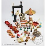A collection of dolls house furniture and toys, to include a a mantle piece,