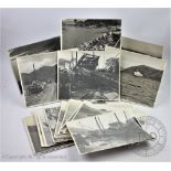 A series of twenty four published photographs of Hong Kong depicting the damage caused by Tyhpoon
