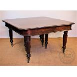 A 19th century inlaid mahogany extending dining table,
