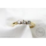 A three stone diamond ring,