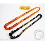 A graduated strand of horn beads,
