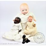 An Armand Marseille bisque head baby doll, model 351, with composition body,