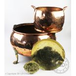 A large 19th century style copper log basket modelled as a cauldron,