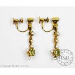 A pair of peridot and seed pearl set drop earrings,