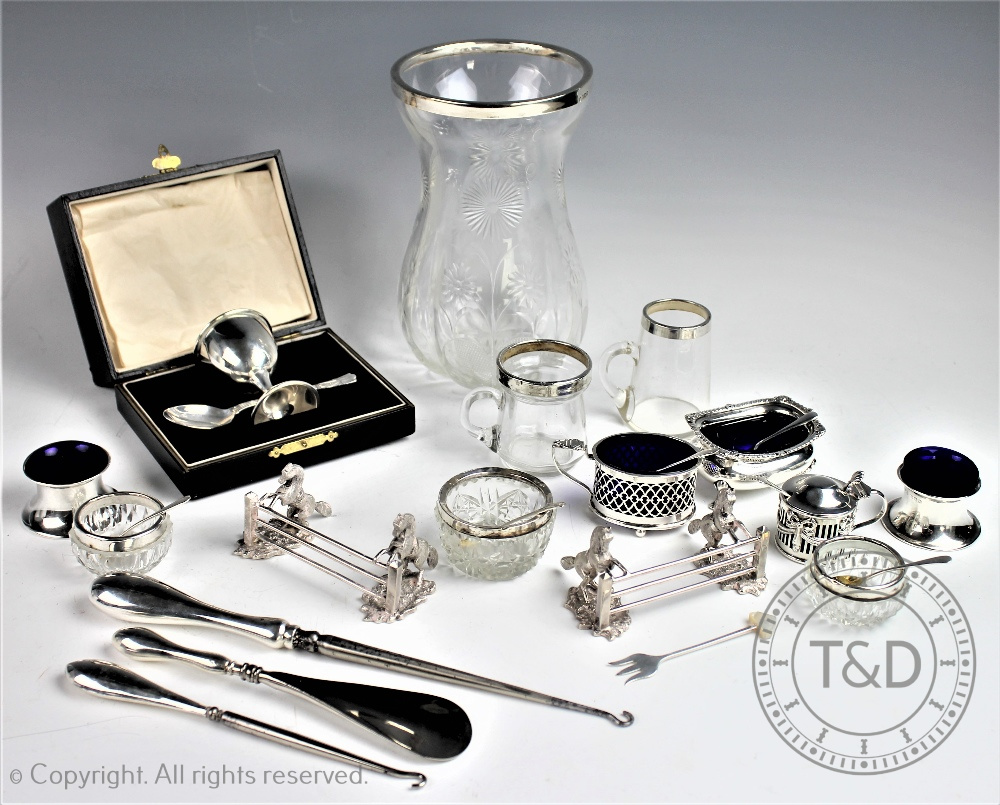 A selection of silver to include, a silver cased christening egg cup, Barker Brothers Silver Ltd,