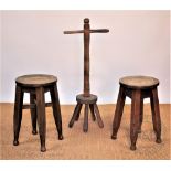 A modern pair of oak stools, with circular seats, 49cm H,