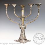 A large five branch silver plated candelabra,