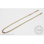 A 9ct yellow gold flat curb link chain, with lobster clasp, gross weight 21.