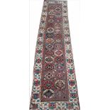 A Caucasian Kazak style hand woven wool runner,