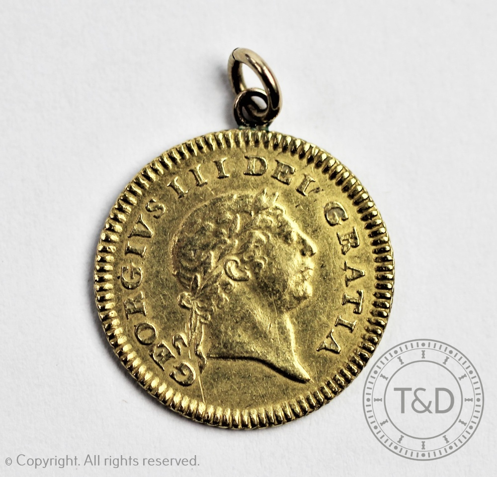 A George III gold quarter Guinea 1804, - Image 2 of 2