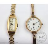 A 9ct yellow gold Benson wristwatch, the rectangular case enclosing Arabic numerals,