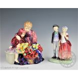 A Royal Doulton 'Flower seller's children', HN1342, 20cm high and Royal Doulton 'Courting', HN2004',
