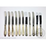 A set of six German silver handled knives, with rostfrei blades and shaped handles, 26cm long,