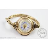 A 14K cased ladies wristwatch,