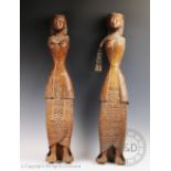 A pair of carved wooden figures, probably Swatt Valley, Pakistan,